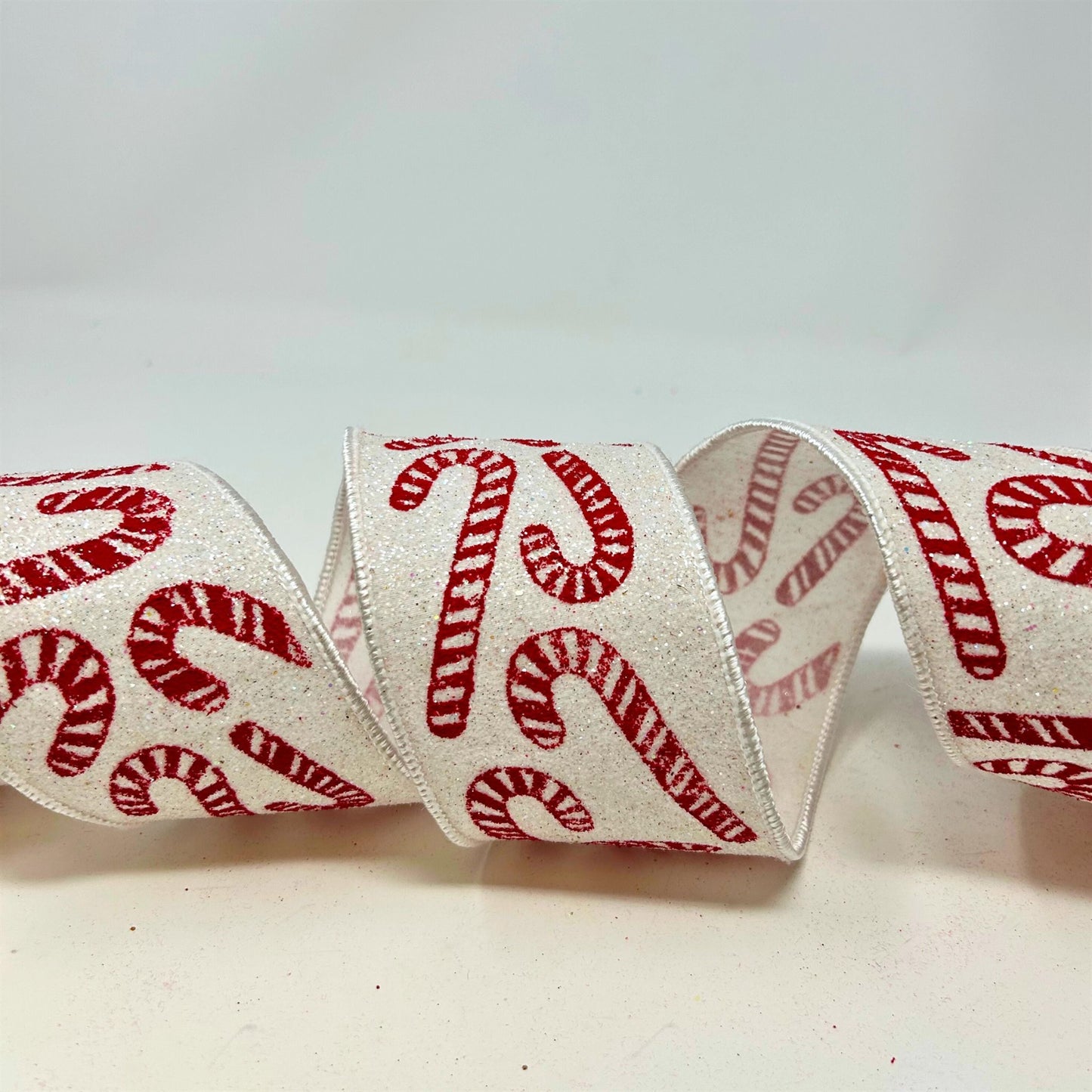 Candy Canes Print on White Glitter Ribbon 2.5" x 10yd | IR