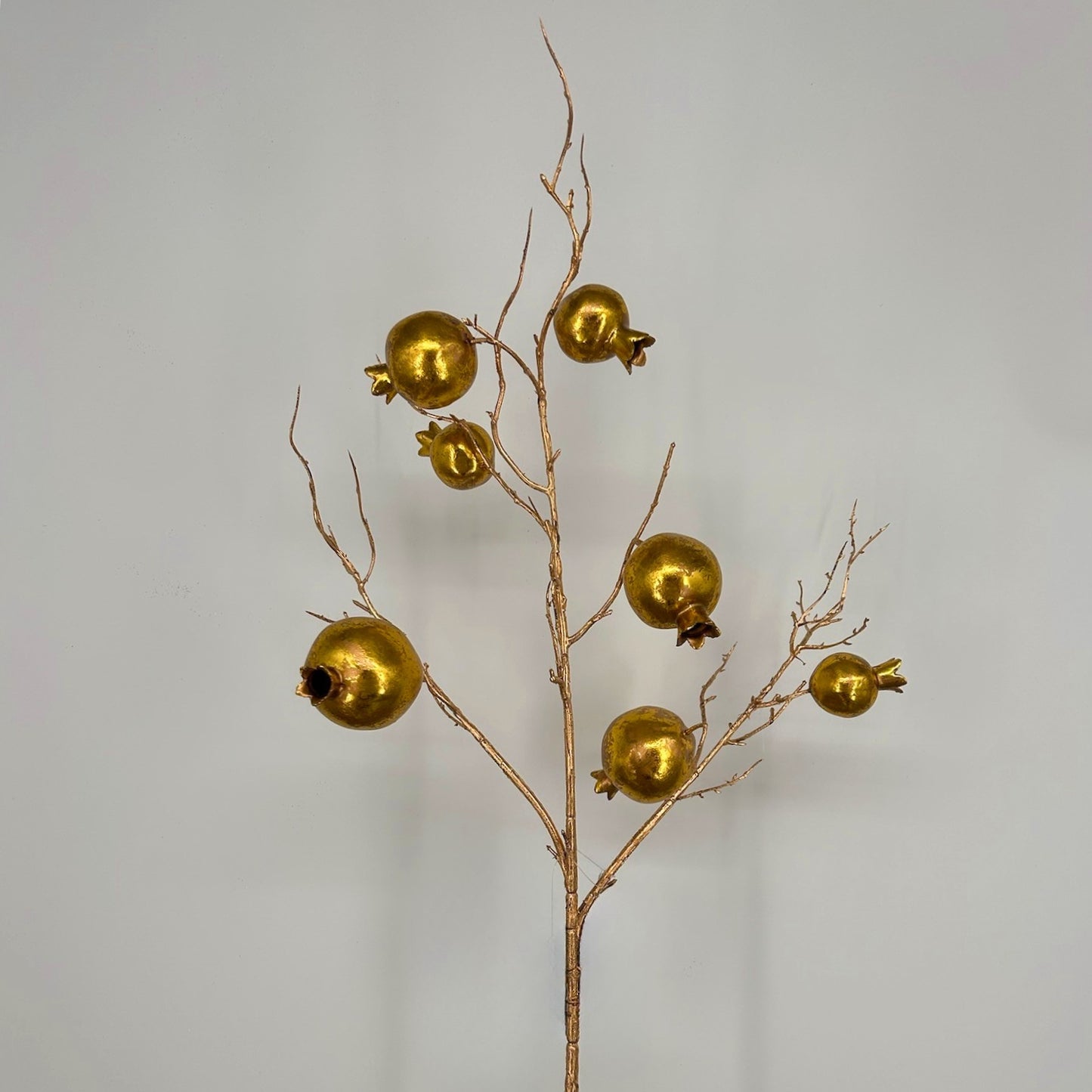 34" Metallic Gold Pomegranate Spray Christmas decoration featuring elegant gold pomegranate accents and a lustrous metallic finish