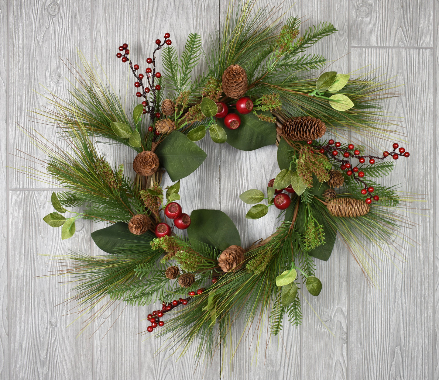 24" Long Needle Pine Leaf Poppy Cone Berry Wreath in Green/Red | QD